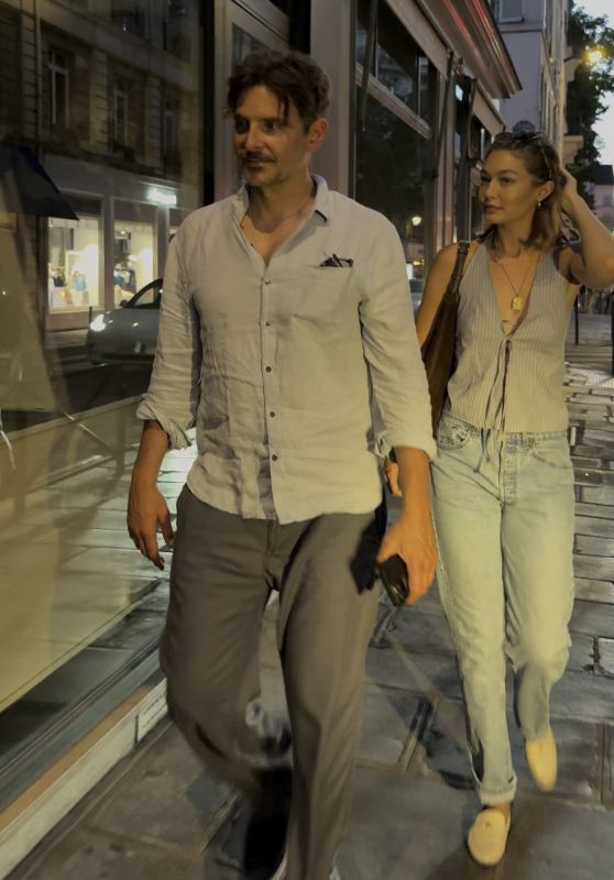 Bradley Cooper & Gigi Hadid: Parisian Return with Fan Flair Bradley Cooper & Gigi Hadid: Parisian Return with Fan Flair