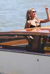 Brooks Nader Channels Italian Allure in Black Mini in Venice