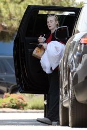 Elle Fanning Airport Style: McDonald