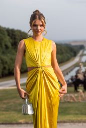 Ellie Thumann Illuminates Max Mara Cruise Show in Radiant Yellow
