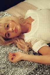 Emily Alyn Lind Evokes Retro Charm for Polyester