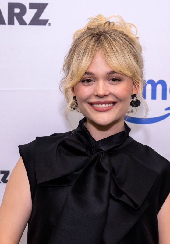 Emily Alyn Lind Unveils Chic Bow Statement at Women in Entertainment Summit