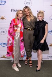 Emily Alyn Lind Unveils Chic Bow Statement at Women in Entertainment Summit
