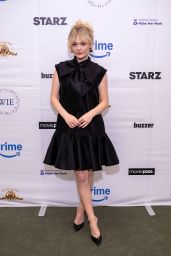 Emily Alyn Lind Unveils Chic Bow Statement at Women in Entertainment Summit