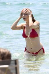 Heather Graham – Heating up in a red bikini, Sardinia Italy June 20 2025
