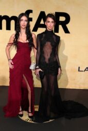 Herbert Twins Unveil Contrasting Glamour at amfAR Cannes 2025