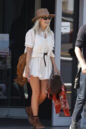 Holly Willoughby Ascends in Boho-Chic at London Heliport