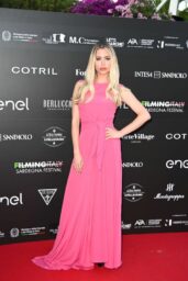 Martina Stella Commands Filming Italy 2025 Red Carpet in Fuchsia