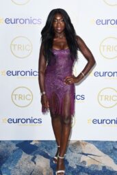 Nana Akua Dazzles in Purple Sparkle at TRIC Awards