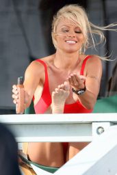 Pamela Anderson Reprises Iconic Red Swimsuit for Baywatch Reshoot in Malibu