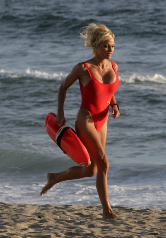 Pamela Anderson Reprises Iconic Red Swimsuit for Baywatch Reshoot in Malibu