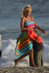 Pamela Anderson Reprises Iconic Red Swimsuit for Baywatch Reshoot in Malibu