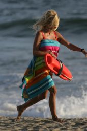 Pamela Anderson Reprises Iconic Red Swimsuit for Baywatch Reshoot in Malibu
