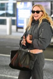 Sophie Turner Debuts Airport Chic at JFK