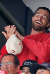 Swift Cheers Stanley Cup Final in Area Track Suit