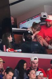 Swift Cheers Stanley Cup Final in Area Track Suit