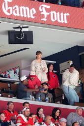 Swift Cheers Stanley Cup Final in Area Track Suit