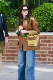 Anne Hathaway Bookshops in Gold Lamé and Flared Denim NYC