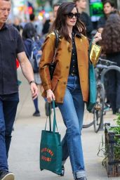 Anne Hathaway Bookshops in Gold Lamé and Flared Denim NYC