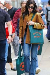 Anne Hathaway Bookshops in Gold Lamé and Flared Denim NYC