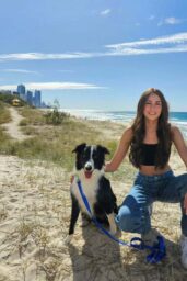 Ava Shepherd Unveils Coastal Denim Chic in Beachside Moment