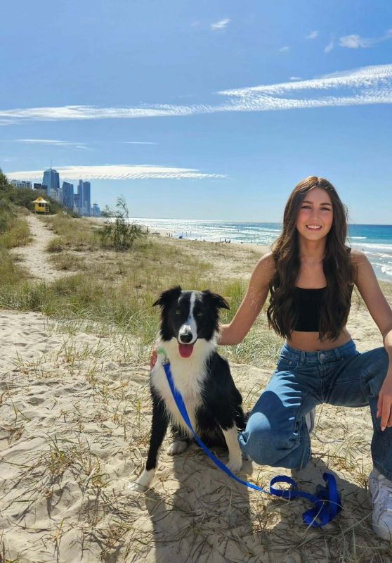 Ava Shepherd Unveils Coastal Denim Chic in Beachside Moment