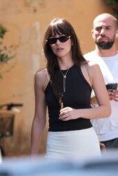 Dakota Johnson Debuts Whiplash Chic on Roma Streets