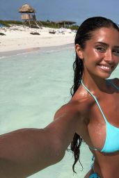 Débora Gomes: Embracing Vacation Vibes in Blue and White