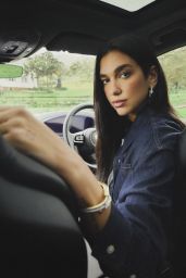 Dua Lipa Drives the Narrative: Chic Denim, Porsche Power, Pure Poise