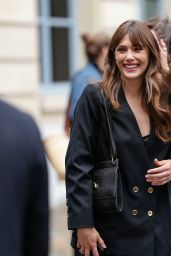 Elizabeth Olsen Commands Patou Show in Polished Power Suit