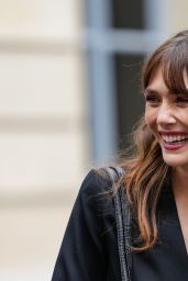 Elizabeth Olsen Commands Patou Show in Polished Power Suit