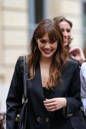 Elizabeth Olsen Commands Patou Show in Polished Power Suit