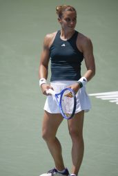 Emma Raducanu Triumphs in DC Quarterfinal