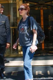 Emma Roberts Exits Parisian Hotel with Vintage Edge