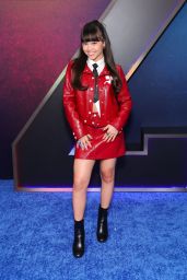 Faith Hedley Attends ‘Zombies 4’ Premiere in Red Leather Prep at El Capitan