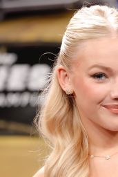 Freya Skye Debuts Glimmering Mini at "Zombies 4" Premiere