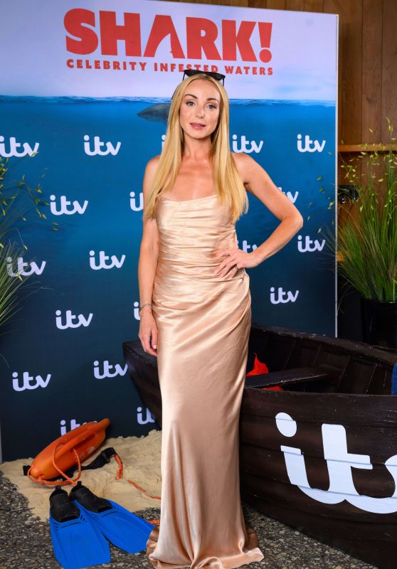 Helen George Gleams in Champagne Silk for "Shark!" Launch