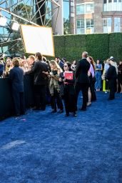 Hermione Corfield Floats in Feathered White at “Outlander” LA Premiere