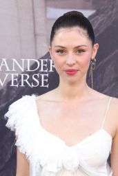 Hermione Corfield Floats in Feathered White at “Outlander” LA Premiere