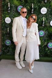 Isla Fisher Aces Wimbledon Style in Pristine White