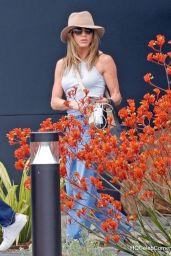 Jennifer Aniston Flaunts Sculpted Arms After Spain Getaway