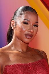 Jordan Chiles Shines in Red at "Superman" Premiere in Los Angeles