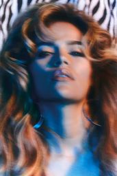 Karol G Unleashes Bold Glamour in ELLE Spain