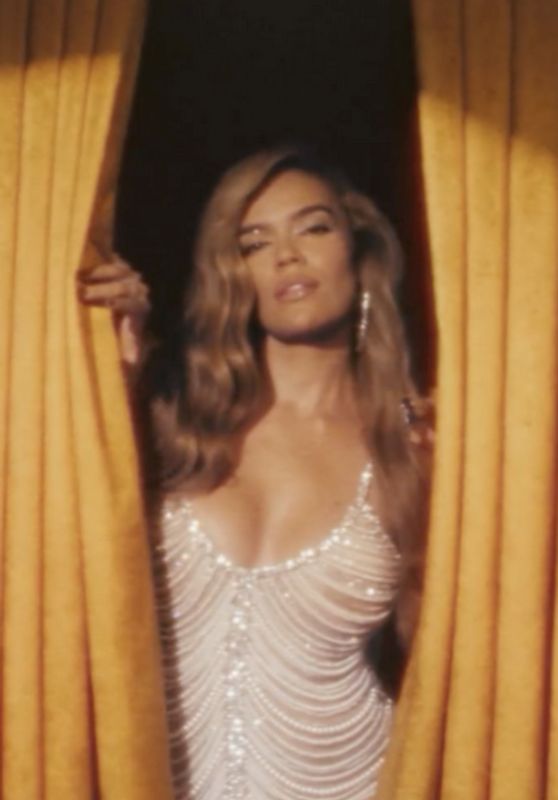 Karol G Unveils Vintage Sparkle in Airbnb Video Shoot – July 2025