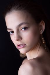 Kristina Tarasenko Unveils Golden Aura in 2025 Photoshoot