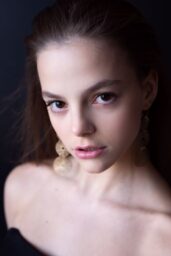 Kristina Tarasenko Unveils Golden Aura in 2025 Photoshoot