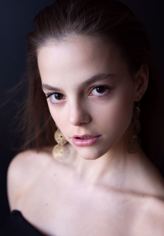 Kristina Tarasenko Unveils Golden Aura in 2025 Photoshoot