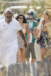 Kylie Jenner’s St. Tropez Sojourn: Striped Chic and Dune Whispers