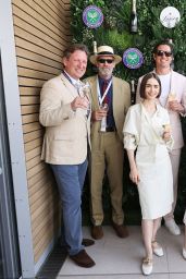 Lily Collins Attends Wimbledon Final in Sculptural Calvin Klein and Whiplash Flats