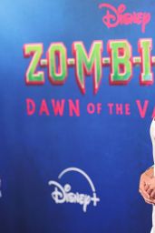Lumi Pollack Debuts Striking White at "Zombies 4" Premiere